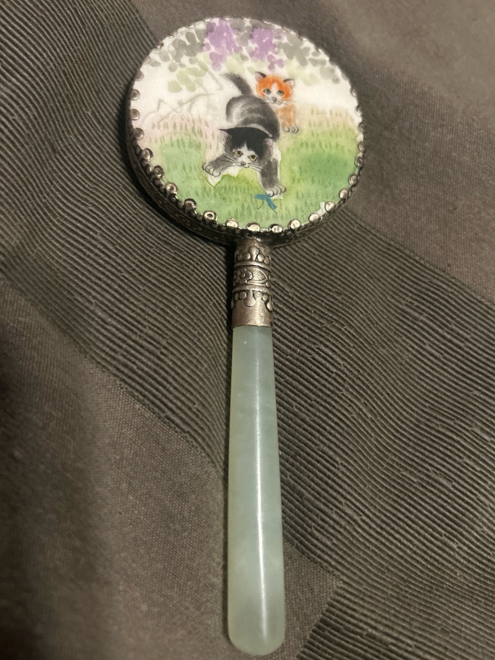 Enamel Hand Mirror with Playful Cat Illustration and Pale Green Handle